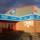 continuous fascia panel wrapping around industrial building