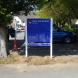 Free-standing direction sign with magnetic event panels