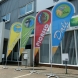 A group of teardrop flags for Ilfracombe Academy depicting House names.